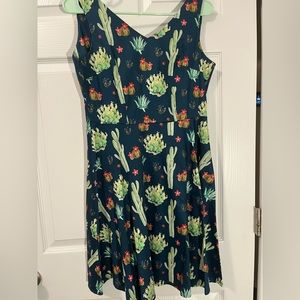 Size small cactus print, fitted waste and a-line skirt. Never worn.